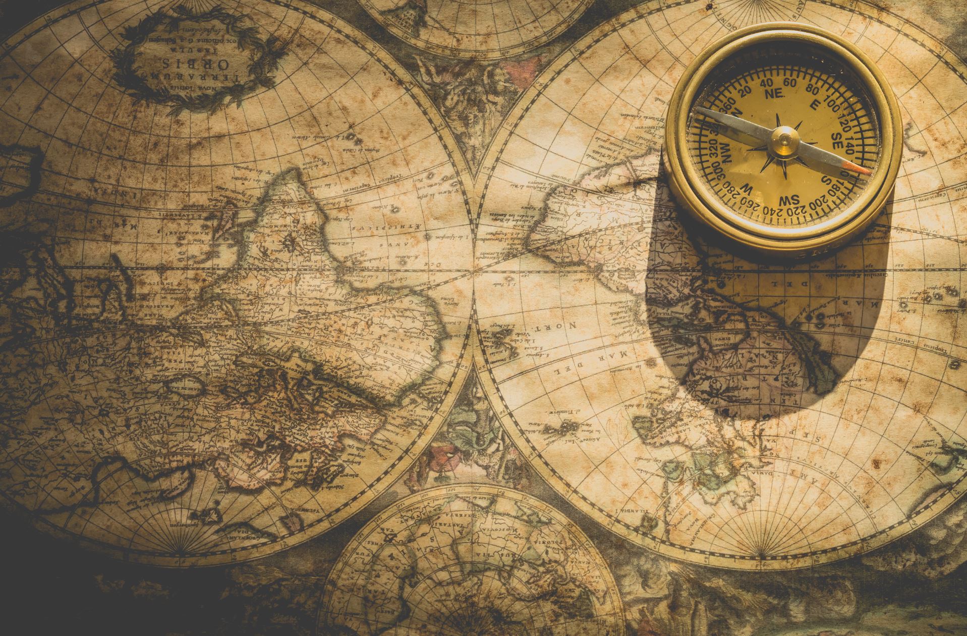 Map and compass. Photo by Ylanite Koppens from Pexels
